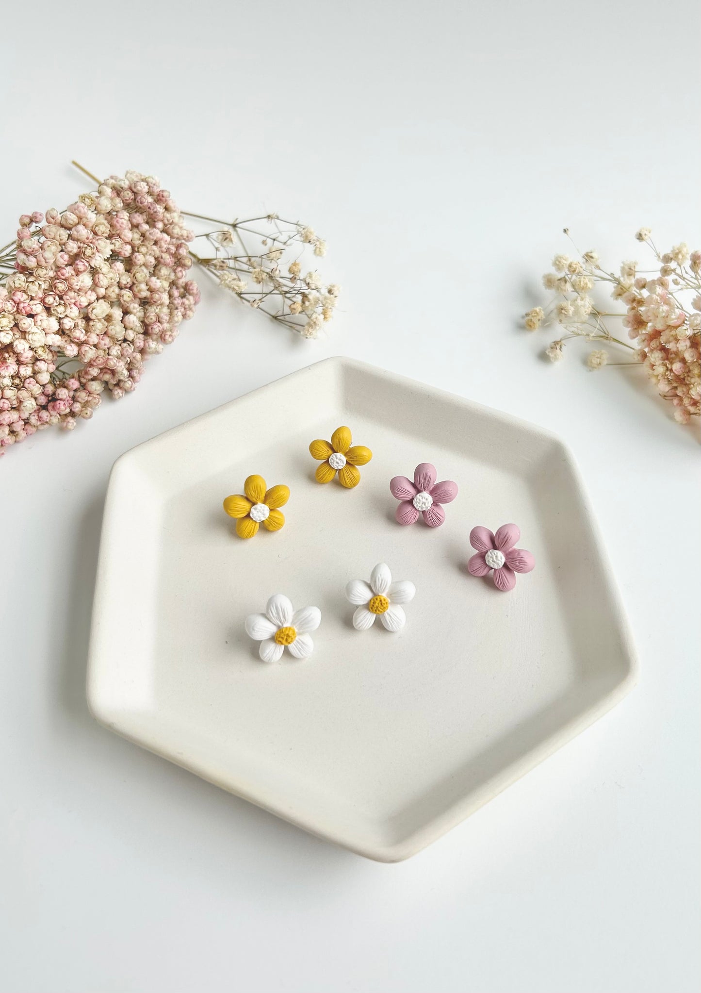 8. Floral Clay Stud Earrings