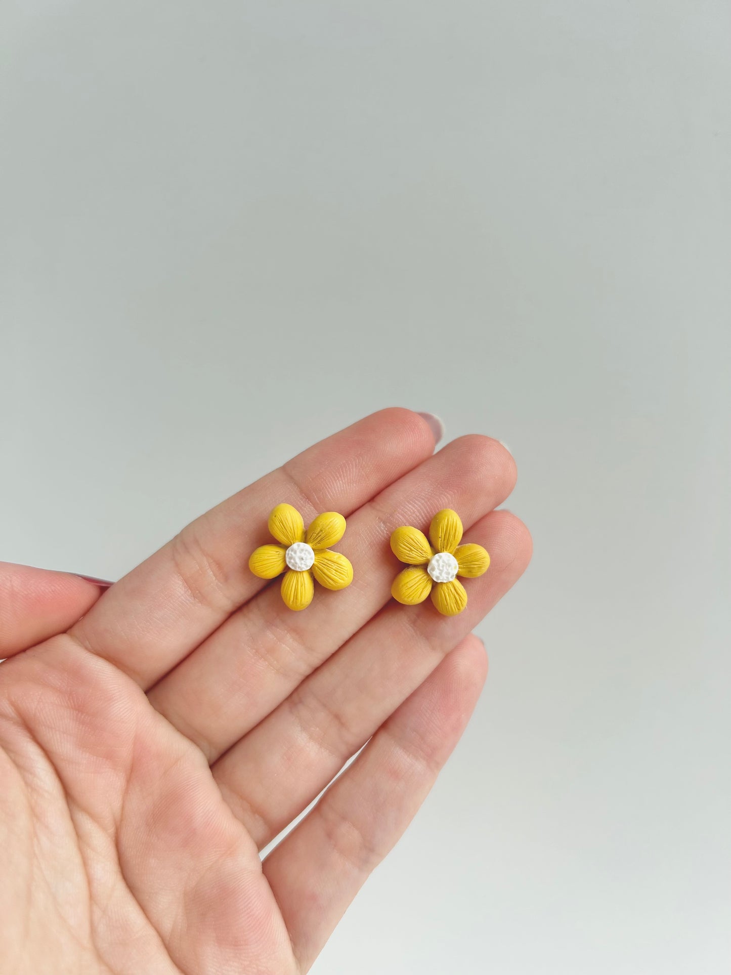 8. Floral Clay Stud Earrings