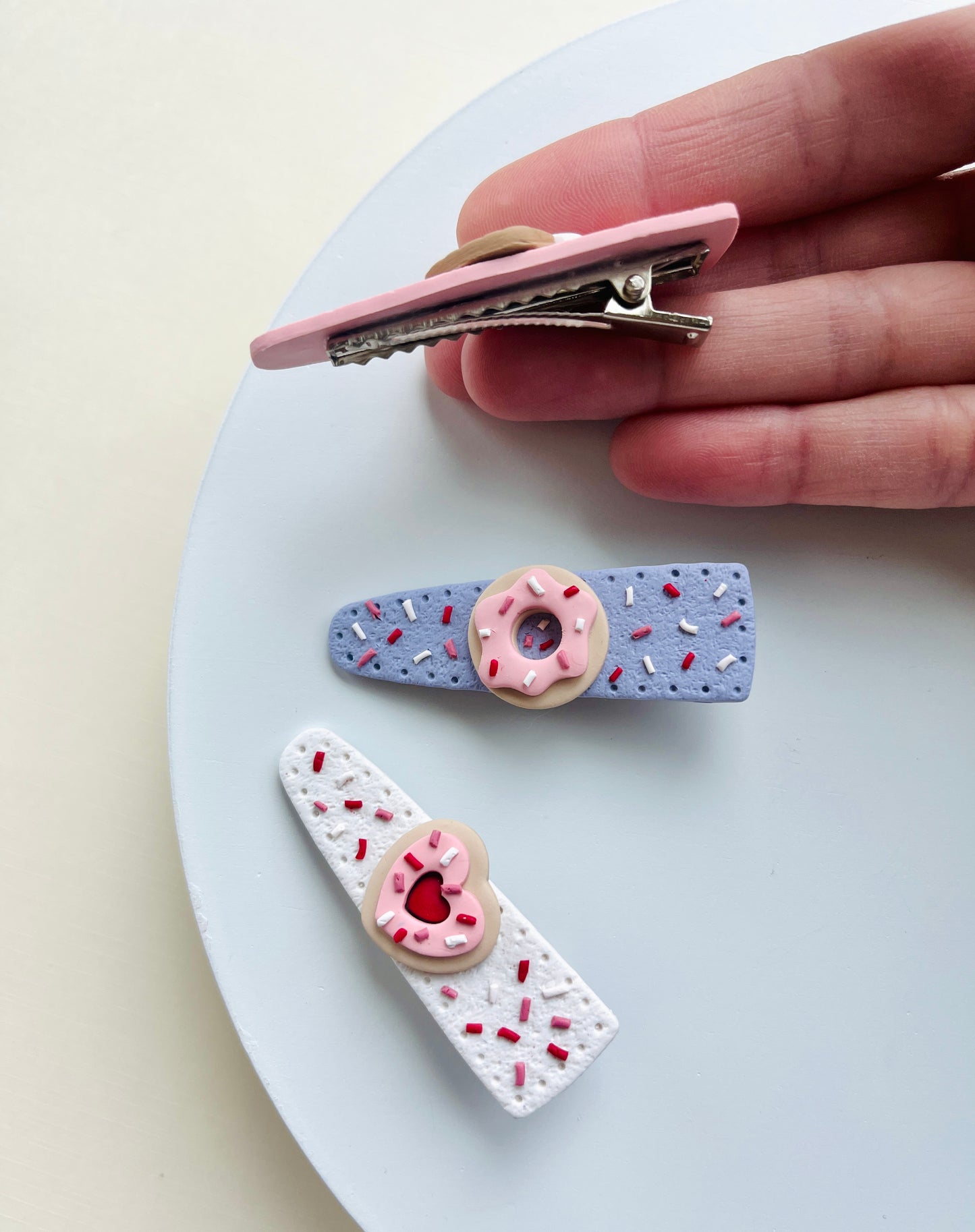 .  Hair clips, hair barretes